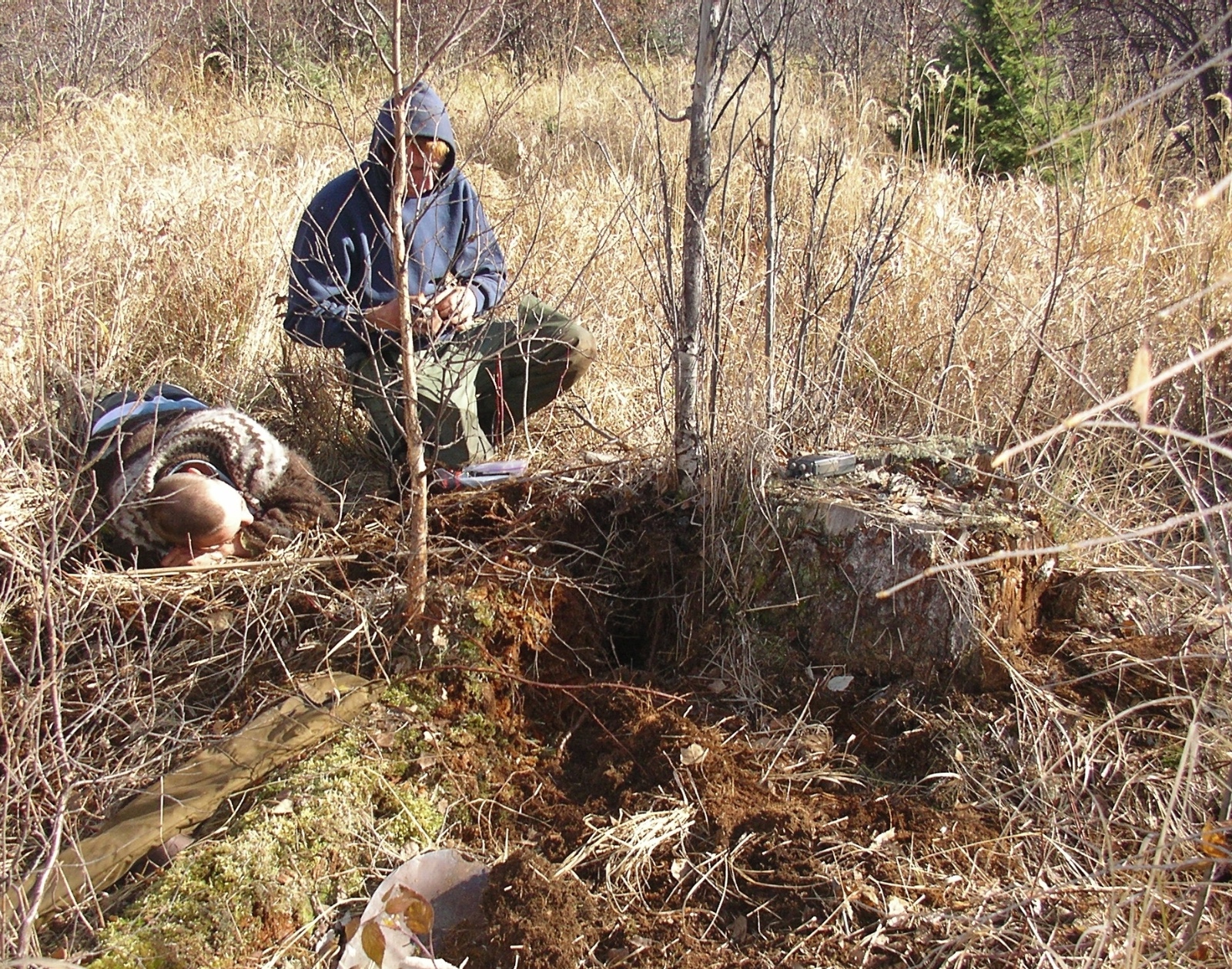 Dru and Steve at a decayed root channel hibernacula